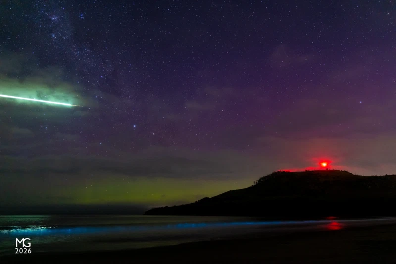 Space Junk A Boxing Day treat! Strong solar weather on Boxing Day 2022 generated a strong Aurora Australis, visible as far north as the Murray River. Down in Tasmania however, we got an extra treat: space junk burning up on re-entry over a strong bioluminescence event. Captured at Seven Mile Beach, the red beacon on the hill is a marker for Hobart Airport, out of frame behind me.