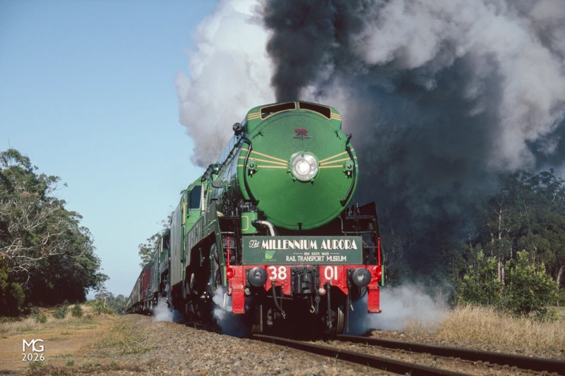Heft Climbing their way inland from Portland, 3801 and 3830 approach Milltown Mission road bound for their overnight stop at Dimboola.