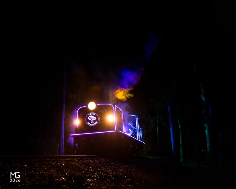 Train of Lights 2023 NG/G16 129 erupts through Fielder station with the first "Train of Lights" train for the 2023 season.