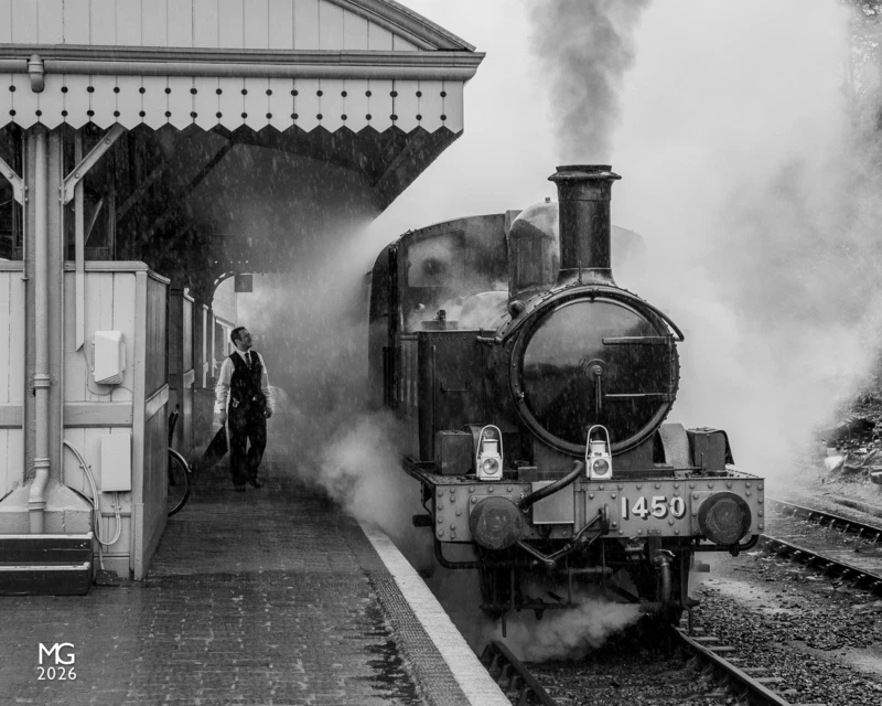 Impressed The guard of 1450's single-carriage train has a quick chat with the loco crew shortly before departing for Kidderminster.