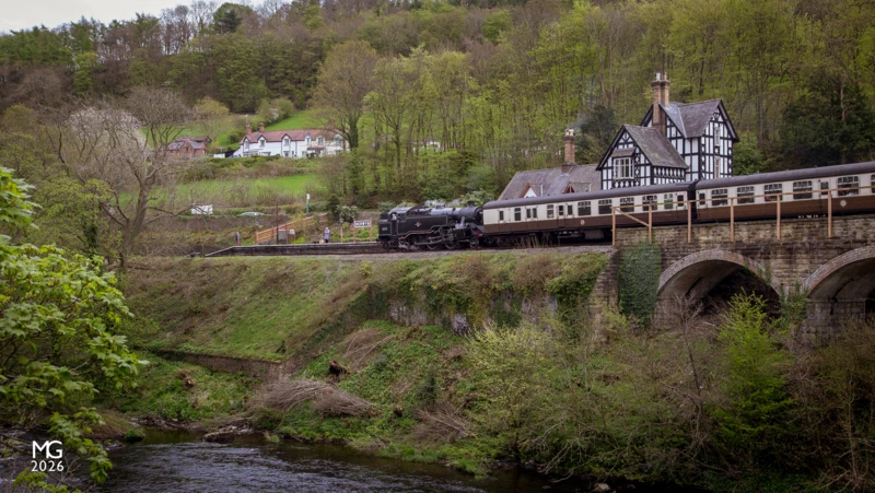 Berwyn Ex-British Railways no. 80072 eases into the riverside station of Berwyn, on the Llangollen Railway in North Wales.Situated on the present day Llangollen Railway the station was opened in 1865 as part of the Llangollen and Corwen railway, which later formed part of the larger Ruabon-Barmouth railway. The station fell into disuse in December 1964, before the lines closure in January 1965. The famous Chain Bridge is just out-of-shot on the left.